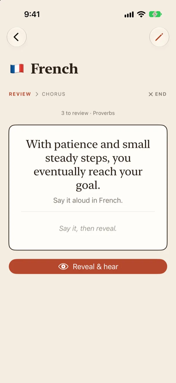 Review card asking you to say “With patience and small steady steps, you eventually reach your goal” aloud in French, with a Reveal and hear button